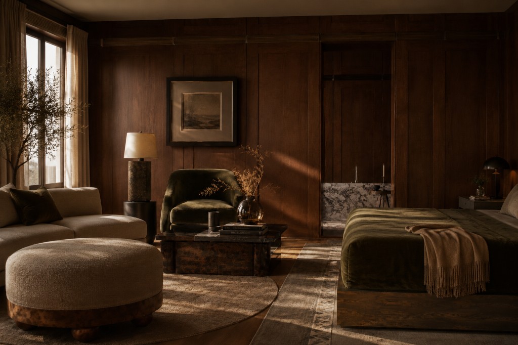 Soft Heritage interior with dark wood paneling, olive velvet seating, and warm natural light